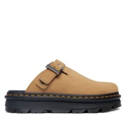 Klapki Dr. Martens. Brązowe klapki damskie Dr Martens, bez wzorów, bez obcasa, bez zapięcia. Za 543.99 zł.