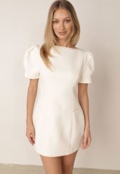 Jasnobeżowa Elegancka Sukienka o Kroju Bombki Ozdobiona Imitacją Kieszeni Ialane. Brązowe sukienki damskie Born2be, bez wzorów, biznesowe, bez ramiączek. Za 179.99 zł.